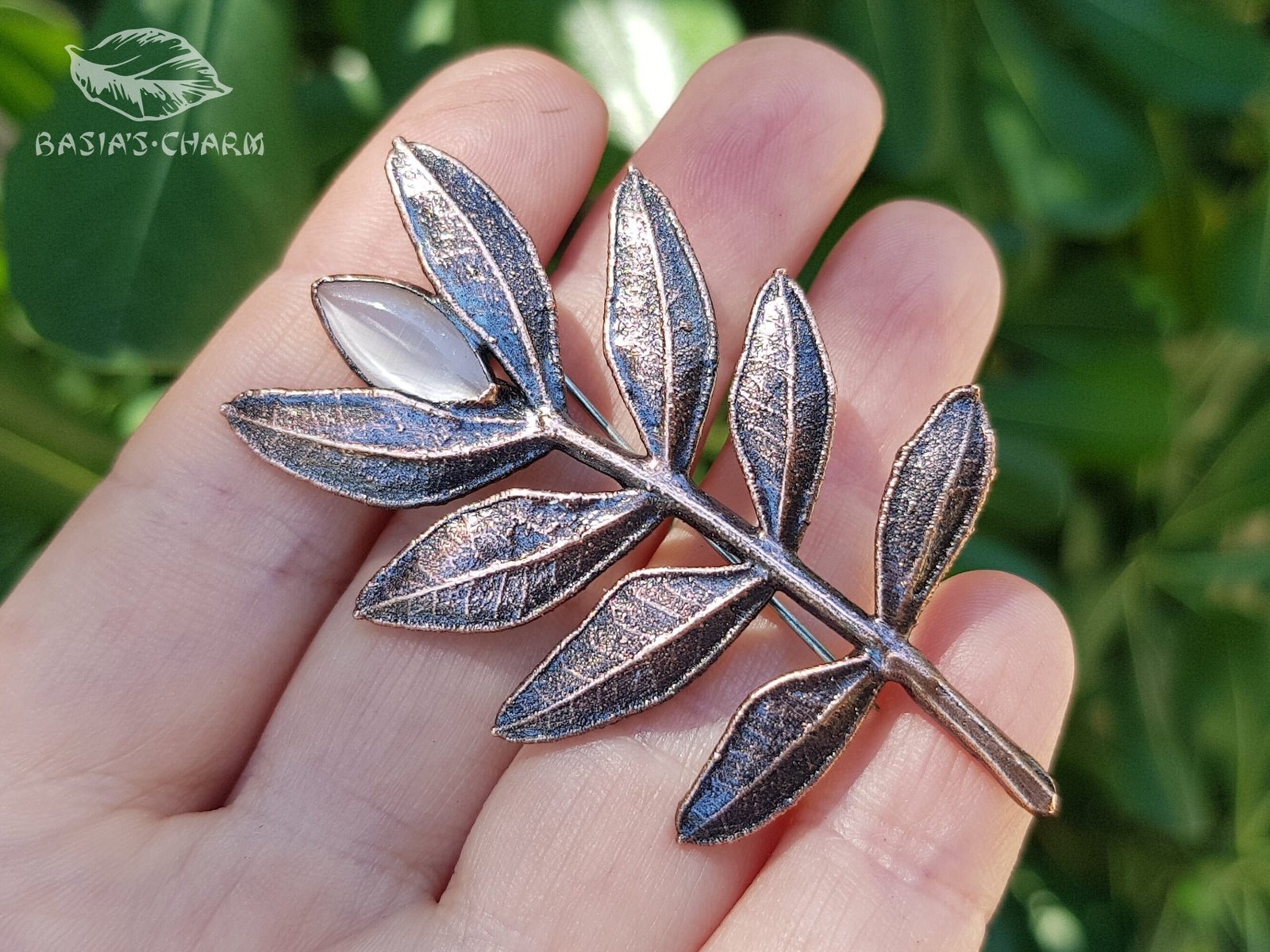 Branch with Cat Eye glass Brooch