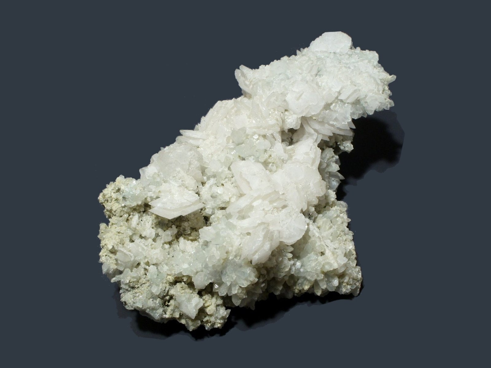 Calcite crystals on Quartz