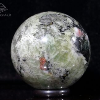 Eudialyte in green microcline